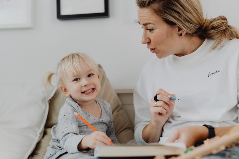 A joyful child and an adult engaged in learning at home, fostering creativity and connection.