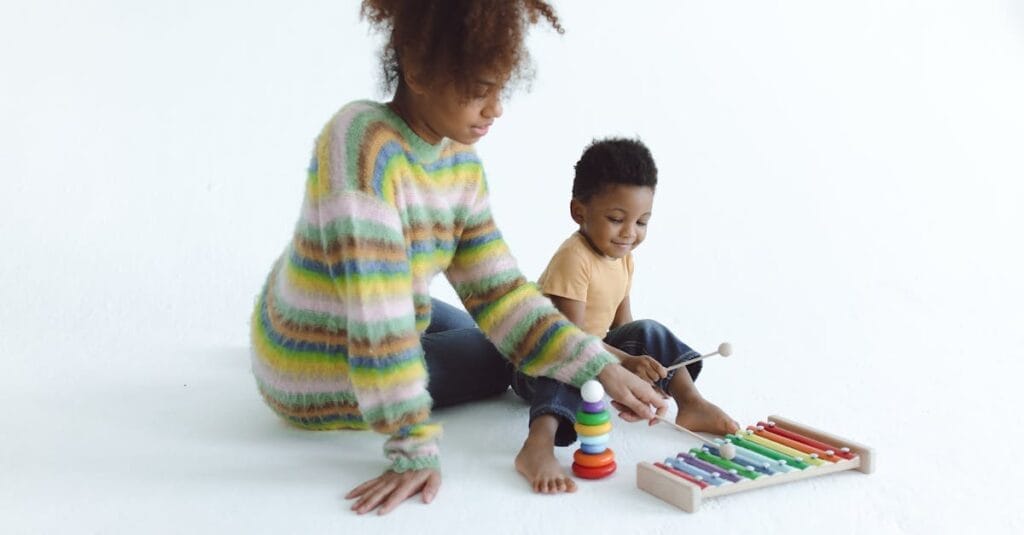 Mother and child enjoying playtime with colorful educational toys in a bright setting.