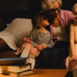 Grandmother bonding with her grandchildren in cozy living room setting.