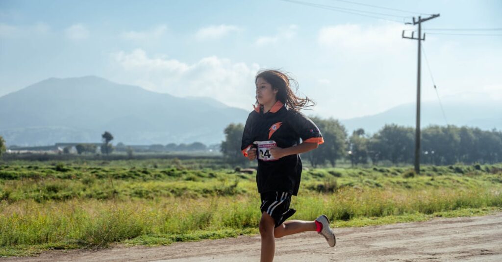 A young girl jogging outdoors on a rural dirt road, showcasing sports and fitness.