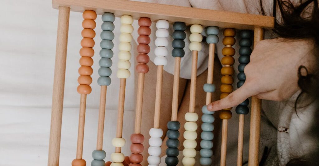 A child playing with a colorful wooden abacus, focusing on math learning and development.