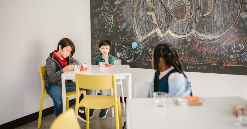 Diverse group of children in a classroom setting involved in conversation.