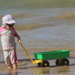 child playing, nature, beach, children playing, playing in the sand, kid, joy of child, playing, costa, play, beira mar, summer, tranquility, fun, child on the beach