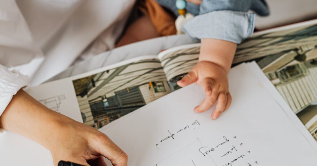A mother writing while holding her baby in a cozy home office setting, illustrating multitasking.
