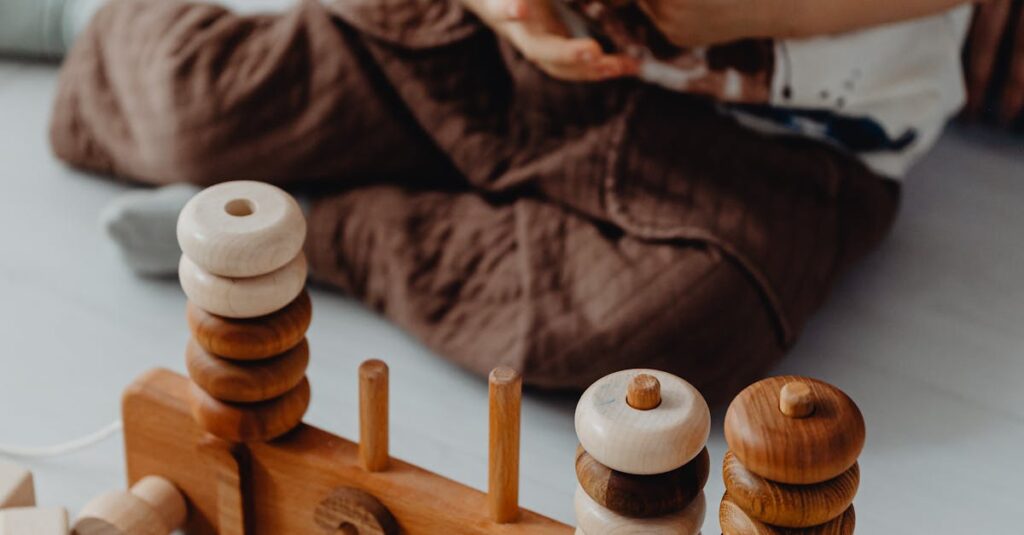 A child engaged in fun learning with a wooden stacking toy and blocks for imaginative play.