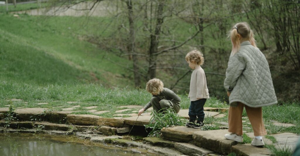 Three children exploring a pond in a lush, green setting during spring. A serene outdoor adventure.