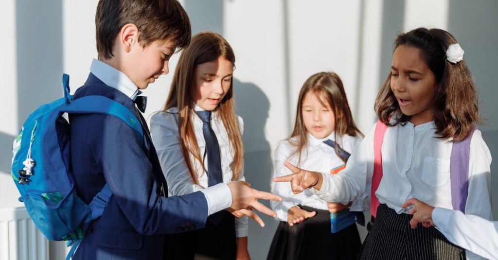 Group of diverse school children in uniform playing rock paper scissors indoors.