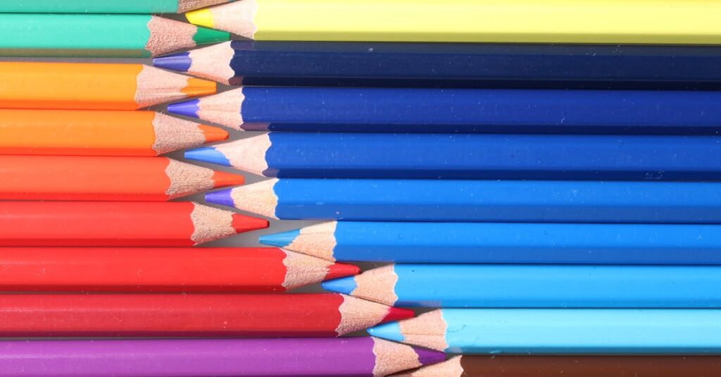 Colorful and organized colored pencils forming a vivid pattern. Perfect for creative projects or artistic inspiration.